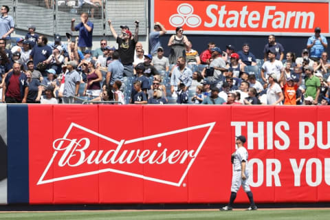 Jun 26, 2016; Bronx, NY, USA; New York Yankees left fielder Brett Gardner (11) watches the home run ball hit by Minnesota Twins third baseman Trevor Plouffe (24) (not pictured) during the sixth inning at Yankee Stadium. Mandatory Credit: Anthony Gruppuso-USA TODAY Sports