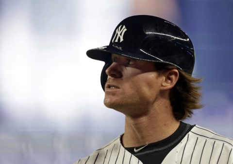 May 11, 2016; Bronx, NY, USA; New York Yankees left fielder Ben Gamel (38) walks back to the dugout after grounding out against the Kansas City Royals during the ninth inning at Yankee Stadium. The Royals won 7-3. Mandatory Credit: Adam Hunger-USA TODAY Sports