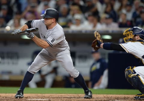 Jul 2, 2016; San Diego, CA, USA; New York Yankees left fielder Brett Gardner (11) sacrifice bunts during the sixth inning to move the runner over at Petco Park. He would reach first on a throwing error. Mandatory Credit: Jake Roth-USA TODAY Sports