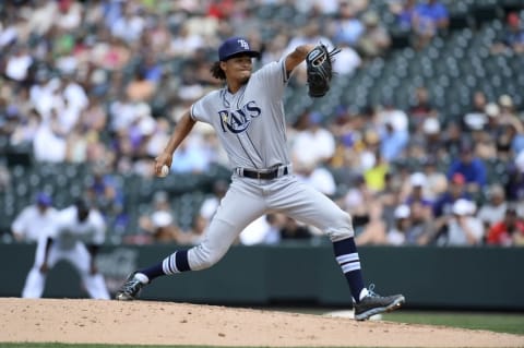 Jul 20, 2016; Denver, CO, USA; Tampa Bay Rays starting pitcher Chris Archer (22) delivers a pitch in the third inning against the Colorado Rockies at Coors Field. Mandatory Credit: Ron Chenoy-USA TODAY Sports