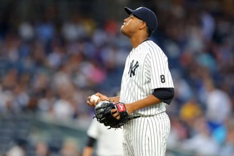 Jun 27, 2016; Bronx, NY, USA; New York Yankees starting pitcher Ivan Nova (47) reacts after allowing a run to the Texas Rangers during the third inning at Yankee Stadium. Mandatory Credit: Brad Penner-USA TODAY Sports