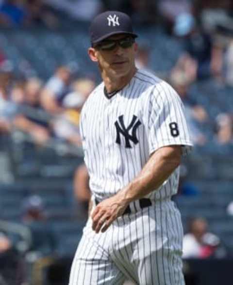 Aug 14, 2016; Bronx, NY, USA; New York Yankees manager Joe Girardi (28) in a game against the Tampa Bay Rays at Yankee Stadium. The Tampa Bay Rays won 12-3. Mandatory Credit: Bill Streicher-USA TODAY Sports