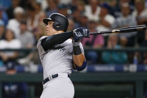 Aug 23, 2016; Seattle, WA, USA; New York Yankees right fielder Aaron Judge (99) hits a RBI-sacrifice fly against the Seattle Mariners during the sixth inning at Safeco Field. Mandatory Credit: Joe Nicholson-USA TODAY Sports