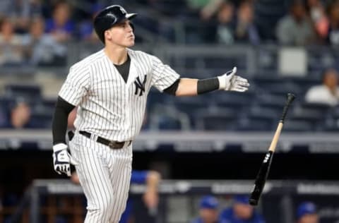 Sep 6, 2016; Bronx, NY, USA; New York Yankees first baseman Tyler Austin (26) flips his bat after hitting a two-run home run against the Toronto Blue Jays during the seventh inning at Yankee Stadium. Mandatory Credit: Brad Penner-USA TODAY Sports