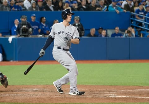 Sep 21, 2015; Toronto, Ontario, CAN; New York Yankees first baseman Greg Bird (31) reacts to a hit during the seventh inning in a game against the Toronto Blue Jays at Rogers Centre. The Toronto Blue Jays won 4-2. Mandatory Credit: Nick Turchiaro-USA TODAY Sports