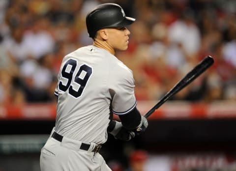 August 20, 2016; Anaheim, CA, USA; New York Yankees right fielder Aaron Judge (99) hits a two run RBI single in the sixth inning against Los Angeles Angels at Angel Stadium of Anaheim. Mandatory Credit: Gary A. Vasquez-USA TODAY Sports