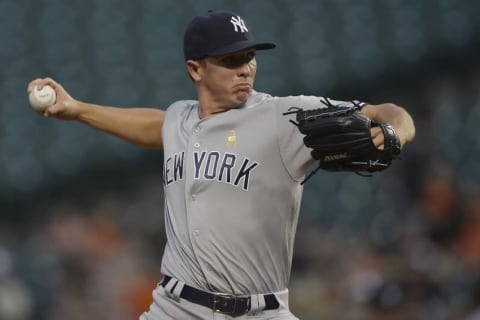 Sep 2, 2016; Baltimore, MD, USA; New York Yankees starting pitcher Chad Green (57) pitches during the first inning against the Baltimore Orioles at Oriole Park at Camden Yards. Mandatory Credit: Tommy Gilligan-USA TODAY Sports