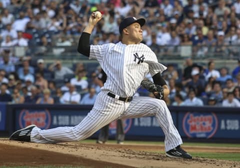 Sep 10, 2016; Bronx, NY, USA; New York Yankees pitcher Masahiro Tanaka (19) pitches in the 2nd inning against the Tampa Bay Rays at Yankee Stadium. Mandatory Credit: Wendell Cruz-USA TODAY Sports