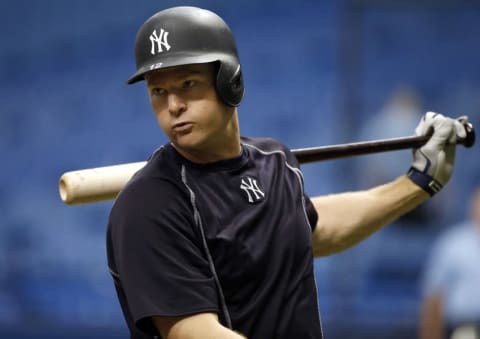 Sep 21, 2016; St. Petersburg, FL, USA; New York Yankees third baseman Chase Headley (12) works out prior to the game against the Tampa Bay Rays at Tropicana Field. Mandatory Credit: Kim Klement-USA TODAY Sports