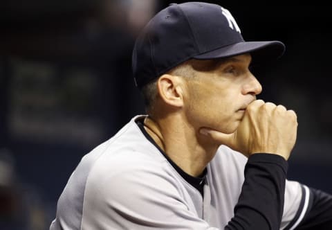 Sep 22, 2016; St. Petersburg, FL, USA; New York Yankees manager Joe Girardi (28) looks on against the Tampa Bay Rays at Tropicana Field. Mandatory Credit: Kim Klement-USA TODAY Sports