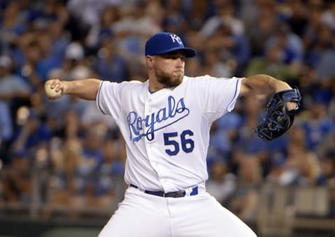 Sep 8, 2015; Kansas City, MO, USA; Kansas City Royals relief pitcher Greg Holland (56) delivers a pitch against the Minnesota Twins in the ninth inning at Kauffman Stadium. Kansas City won the game 4-2. Mandatory Credit: John Rieger-USA TODAY Sports