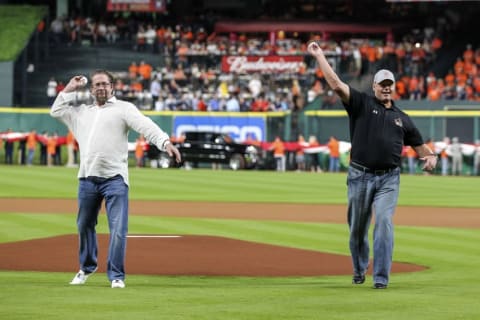 Apr 11, 2016; Houston, TX, USA; Houston Astros former players Jeff Bagwell (left) and Roger Clemens (right) throw out a ceremonial first pitch before a game against the Kansas City Royals at Minute Maid Park. Mandatory Credit: Troy Taormina-USA TODAY Sports