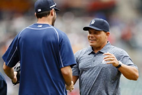 May 7, 2016; Detroit, MI, USA; Former Detroit Tigers Ivan Pudge Rodriguez (R) shakes hands with Detroit Tigers starting pitcher Justin Verlander (35) after he throws out the ceremonial first pitch prior to the Tigers. Yankees.