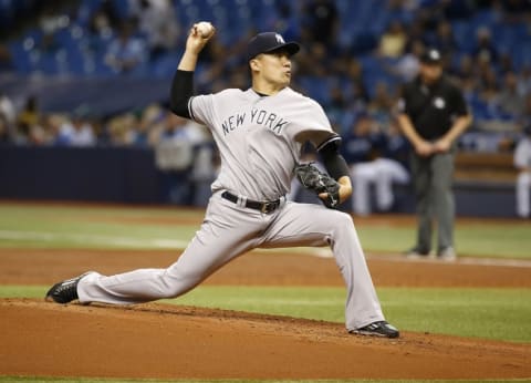 Sep 21, 2016; St. Petersburg, FL, USA; New York Yankees starting pitcher Masahiro Tanaka (19) throws a pitch during the first inning against the Tampa Bay Rays at Tropicana Field. Mandatory Credit: Kim Klement-USA TODAY Sports