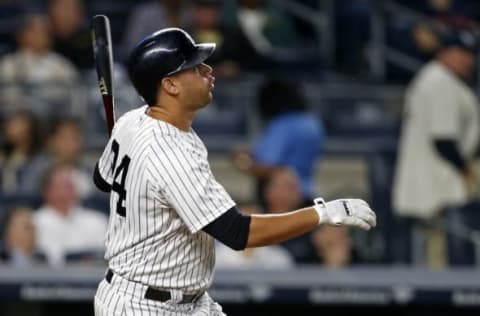 Sep 27, 2016; Bronx, NY, USA; New York Yankees catcher Gary Sanchez (24) hits a two-run home run during the first inning against the Boston Red Sox at Yankee Stadium. Mandatory Credit: Adam Hunger-USA TODAY Sports