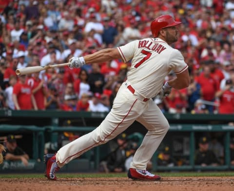 Oct 1, 2016; St. Louis, MO, USA; St. Louis Cardinals pinch hitter Matt Holliday (7) hits an rbi single against the Pittsburgh Pirates at Busch Stadium. Mandatory Credit: Scott Rovak-USA TODAY Sports