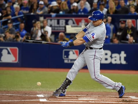 Oct 9, 2016; Toronto, Ontario, CAN; Texas Rangers designated hitter Carlos Beltran drives in a run with a ground out in the first inning against the Toronto Blue Jays during game three of the 2016 ALDS playoff baseball series at Rogers Centre. Mandatory Credit: Dan Hamilton-USA TODAY Sports