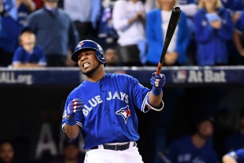 Oct 19, 2016; Toronto, Ontario, CAN; Toronto Blue Jays first baseman Edwin Encarnacion (10) reacts to striking out during the ninth inning against the Cleveland Indians in game five of the 2016 ALCS playoff baseball series at Rogers Centre. Yankees. Mandatory Credit: Nick Turchiaro-USA TODAY Sports