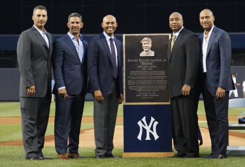 May 24, 2015; Bronx, NY, USA; New York Yankees former players (L-R) Andy Pettitte, Jorge Posada, Mariano Rivera, Bernie Williams, and Derek Jeter pose for a photo during the ceremony retiring Williams number 51 prior to the game against the Texas Rangers at Yankee Stadium. Mandatory Credit: Andy Marlin-USA TODAY Sports