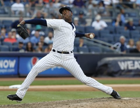 Jul 23, 2016; Bronx, NY, USA; New York Yankees relief pitcher Aroldis Chapman (54) delivers a pitch against the San Francisco Giants in the ninth inning at Yankee Stadium. Mandatory Credit: Noah K. Murray-USA TODAY Sports