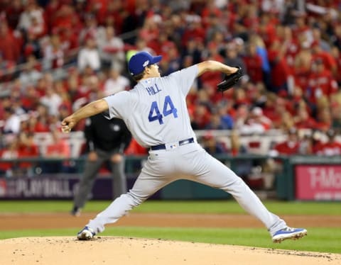 Oct 13, 2016; Washington, DC, USA; Los Angeles Dodgers starting pitcher Rich Hill (44) pitches during the first inning against the Washington Nationals during game five of the 2016 NLDS playoff baseball game at Nationals Park. Mandatory Credit: Geoff Burke-USA TODAY Sports