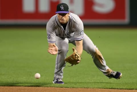 PHOENIX, AZ – SEPTEMBER 22: Second baseman DJ LeMahieu #9 of the Colorado Rockies fields a ground ball against the Arizona Diamondbacks during the ninth inning of an MLB game at Chase Field on September 22, 2018 in Phoenix, Arizona. (Photo by Ralph Freso/Getty Images)