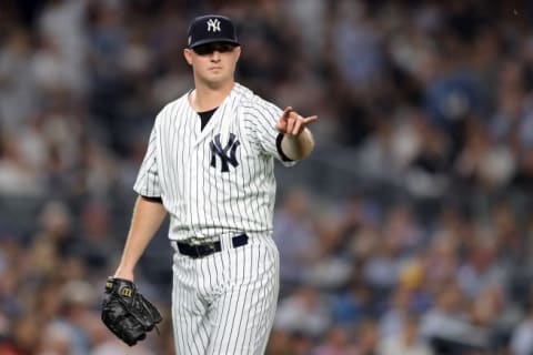 NEW YORK, NEW YORK – OCTOBER 09: Zach Britton #53 of the New York Yankees reacts in the fourth inning against the Boston Red Sox during Game Four American League Division Series at Yankee Stadium on October 09, 2018 in the Bronx borough of New York City. (Photo by Elsa/Getty Images)