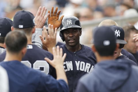 PORT CHARLOTTE, FLORIDA – FEBRUARY 24: Estevan Florial #92 of the New York Yankees celebrates with teammates after scoring a run in the second inning against the Tampa Bay Rays during the Grapefruit League spring training game at Charlotte Sports Park on February 24, 2019 in Port Charlotte, Florida. (Photo by Michael Reaves/Getty Images)