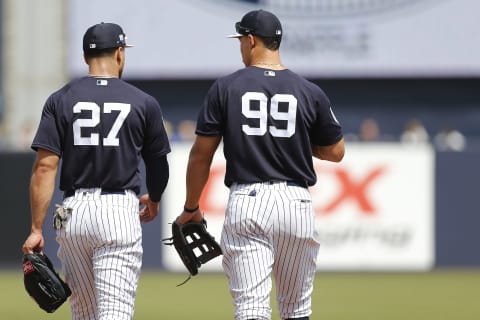 Giancarlo Stanton #27 (L) and Aaron Judge #99 of the New York Yankees (Photo by Michael Reaves/Getty Images)