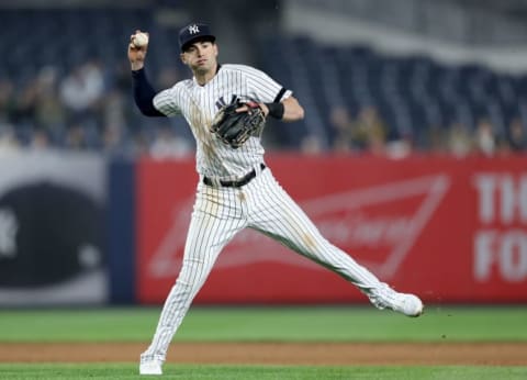 NEW YORK, NEW YORK – MAY 03: Tyler Wade #14 of the New York Yankees fields a hit in the ninth inning against the Minnesota Twins at Yankee Stadium on May 03, 2019 in the Bronx borough of New York City.The New York Yankees defeated the Minnesota Twins 6-3. (Photo by Elsa/Getty Images)