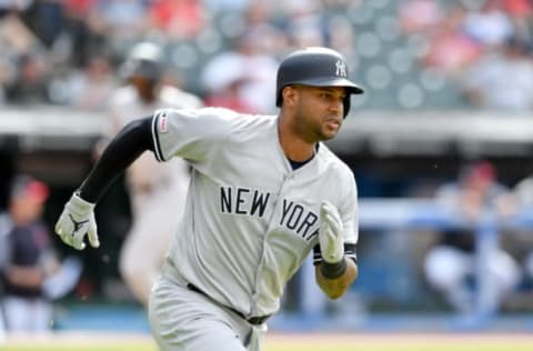 CLEVELAND, OHIO – JUNE 09: Aaron Hicks #31 of the New York Yankees runs out an RBI double scoring Cameron Maybin #38 to take the lead d10 against the Cleveland Indians at Progressive Field on June 09, 2019 in Cleveland, Ohio. (Photo by Jason Miller/Getty Images)