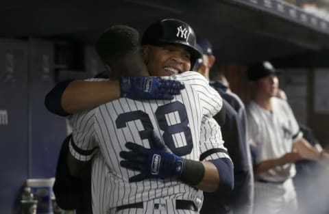 NEW YORK, NEW YORK – JUNE 18: Edwin Encarnacion #30 of the New York Yankees celebrates his eighth inning home run against the Tampa Bay Rays with teammate Cameron Maybin #38 at Yankee Stadium on June 18, 2019 in New York City. (Photo by Jim McIsaac/Getty Images)