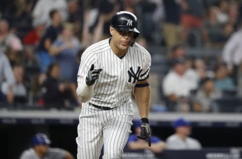 Giancarlo Stanton #27 of the New York Yankees reacts to the dugout (Photo by Michael Owens/Getty Images)