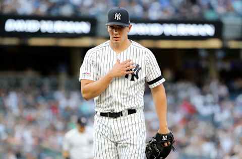 NEW YORK, NEW YORK - AUGUST 03: Chad Green #57 of the New York Yankees heads for the dugout after the first inning against the Boston Red Sox during game two of a double header at Yankee Stadium on August 03, 2019 in New York City. (Photo by Elsa/Getty Images)