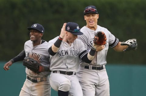 DETROIT, MI - SEPTEMBER 12: Cameron Maybin #38, Clint Frazier #77 and Aaron Judge #99 of the New York Yankees celebrate a win over the Detroit Tigers in game one of a doubleheader at Comerica Park on September 12, 2019 in Detroit, Michigan. New York defeated Detroit Tigers 10-4. (Photo by Leon Halip/Getty Images)