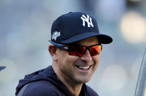 NEW YORK, NEW YORK - OCTOBER 05: Manager Aaron Boone #17 of the New York Yankees watches batting practice before game two of the American League Divisional Series against the Minnesota Twins at Yankee Stadium on October 05, 2019 in the Bronx borough of New York City. (Photo by Elsa/Getty Images)