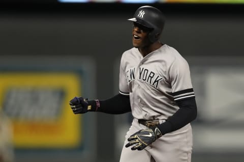 MINNEAPOLIS, MINNESOTA – OCTOBER 07: Cameron Maybin #38 of the New York Yankees celebrates his one run home run against the Minnesota Twins in the ninth inning in game three of the American League Division Series at Target Field on October 07, 2019 in Minneapolis, Minnesota. (Photo by Elsa/Getty Images)