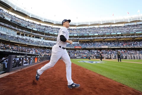 NEW YORK, NEW YORK – OCTOBER 15: Giancarlo Stanton #27 of the New York Yankees takes the field as he is introduced prior to game three of the American League Championship Series against the Houston Astros at Yankee Stadium on October 15, 2019 in New York City. (Photo by Elsa/Getty Images)