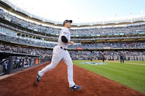 NEW YORK, NEW YORK – OCTOBER 15: Giancarlo Stanton #27 of the New York Yankees takes the field as he is introduced prior to game three of the American League Championship Series against the Houston Astros at Yankee Stadium on October 15, 2019 in New York City. (Photo by Elsa/Getty Images)