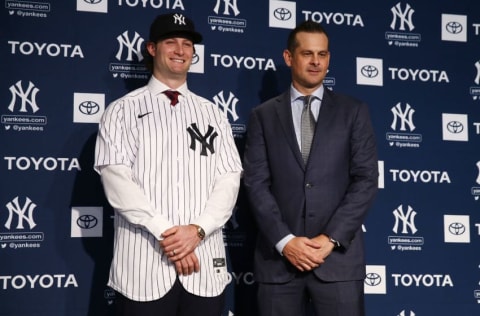 NEW YORK, NEW YORK - DECEMBER 18: Gerrit Cole and Aaron Boone, manager of the New York Yankees pose for a photo at Yankee Stadium during a press conference at Yankee Stadium on December 18, 2019 in New York City. (Photo by Mike Stobe/Getty Images)