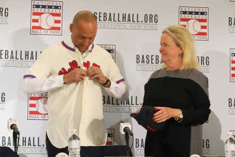 NEW YORK, NEW YORK – JANUARY 22: Derek Jeter puts on his Hall of Fame jersey after being elected into the National Baseball Hall of Fame Class of 2020 on January 22, 2020 at the St. Regis Hotel in New York City. The National Baseball Hall of Fame induction ceremony will be held on Sunday, July 26, 2020 in Cooperstown, NY. (Photo by Mike Stobe/Getty Images)