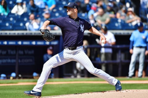 TAMPA, FLORIDA – FEBRUARY 27: J.A. Happ #33 of the New York Yankees delivers a pitch during the first inning of a Grapefruit league spring training game against the Tampa Bay Rays at Steinbrenner Field on February 27, 2020 in Tampa, Florida. (Photo by Julio Aguilar/Getty Images)