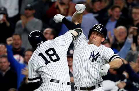 NEW YORK, NY - OCTOBER 03: Didi Gregorius #18 of the New York Yankees celebrates with Brett Gardner #11 after hitting a three run home run against Ervin Santana #54 of the Minnesota Twins during the first inning in the American League Wild Card Game at Yankee Stadium on October 3, 2017 in the Bronx borough of New York City. (Photo by Al Bello/Getty Images)