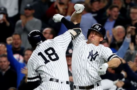 NEW YORK, NY - OCTOBER 03: Didi Gregorius #18 of the New York Yankees celebrates with Brett Gardner #11 after hitting a three run home run against Ervin Santana #54 of the Minnesota Twins during the first inning in the American League Wild Card Game at Yankee Stadium on October 3, 2017 in the Bronx borough of New York City. (Photo by Al Bello/Getty Images)