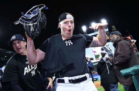 Erik Kratz #36 of the New York Yankees celebrates their 5 to 2 win over the Cleveland Indians in Game Five of the American League Divisional Series at Progressive Field on October 11, 2017 in Cleveland, Ohio. (Photo by Gregory Shamus/Getty Images)