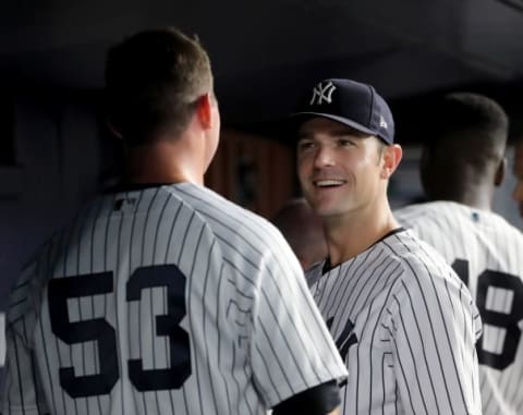 NEW YORK, NY – JULY 26: Zach Britton #53 of the New York Yankees talks with teammate David Robertson #30 in the dugout after the eighth inning against the Kansas City Royals at Yankee Stadium on July 26, 2018 in the Bronx borough of New York City. (Photo by Elsa/Getty Images)