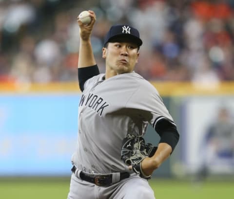 HOUSTON, TX – MAY 03: Masahiro Tanaka #19 of the New York Yankees pitches in the first inning against the Houston Astros at Minute Maid Park on May 3, 2018 in Houston, Texas. (Photo by Bob Levey/Getty Images)