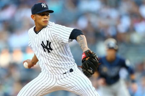 NEW YORK, NY – JUNE 15: Jonathan Loaisiga #38 of the New York Yankees pitches in his MLB debut against the Tampa Bay Rays in the first inning at Yankee Stadium on June 15, 2018 in the Bronx borough of New York City. (Photo by Mike Stobe/Getty Images)