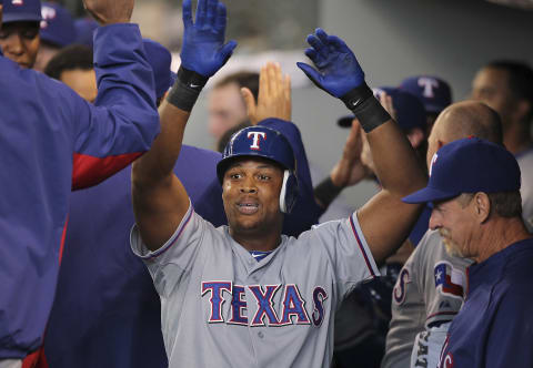 Adrian Beltre celebrates his two-run homer against the Seattle Mariners (Photo by Otto Greule Jr/Getty Images)