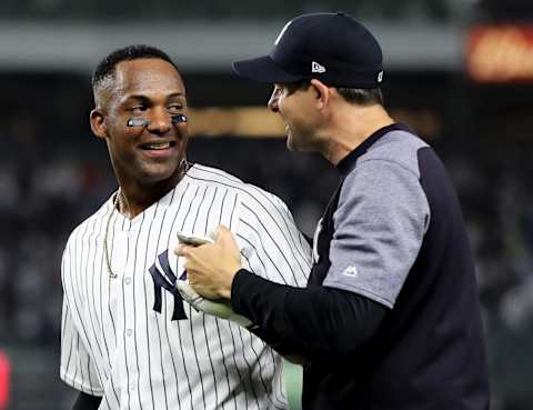 NEW YORK, NY – MAY 04: Miguel Andujar #41 of the New York Yankees is congratulated by manager Aaron Boone #17 after the win over the Cleveland Indians at Yankee Stadium on May 4, 2018 in the Bronx borough of New York City.The New York Yankees defeated the Cleveland Indians 7-6. (Photo by Elsa/Getty Images)